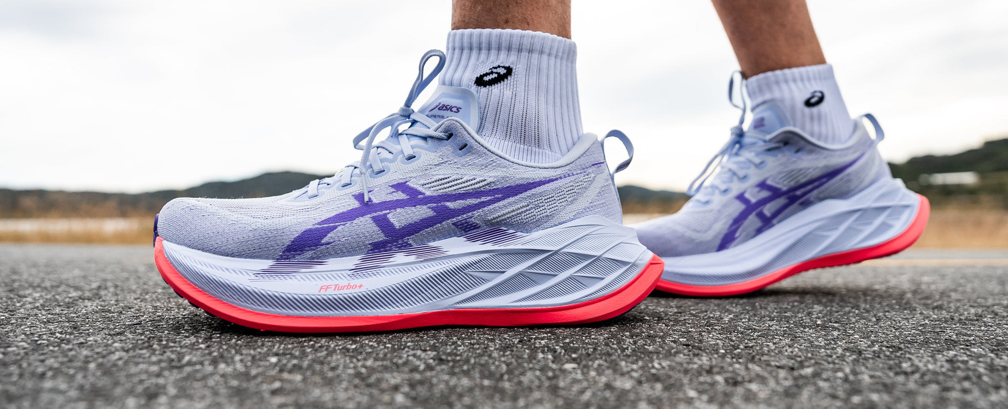 Runner tying running shoe laces, Smiths Sports Shoes running collection