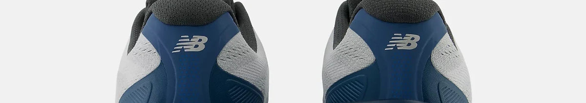 Rear view of blue and grey New Balance running shoes
