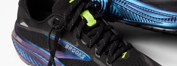 Close-up of black and blue Brooks running shoes