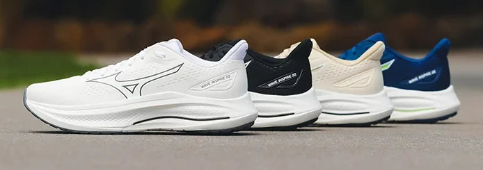 Four Mizuno running shoes in different colours
