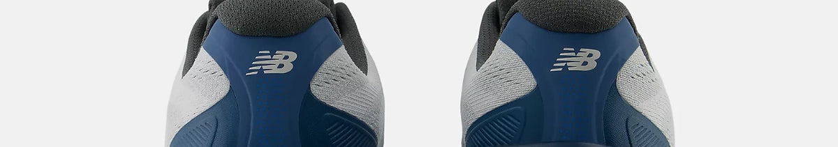 Rear view of blue and grey New Balance running shoes