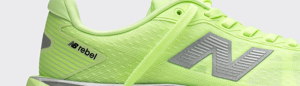 Close-up of a lime New Balance running shoe