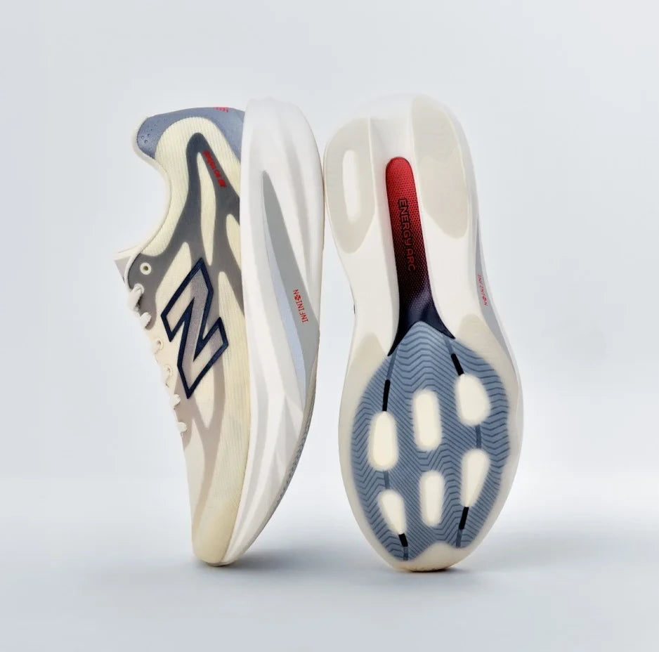 Light-coloured New Balance running shoes showing the sole